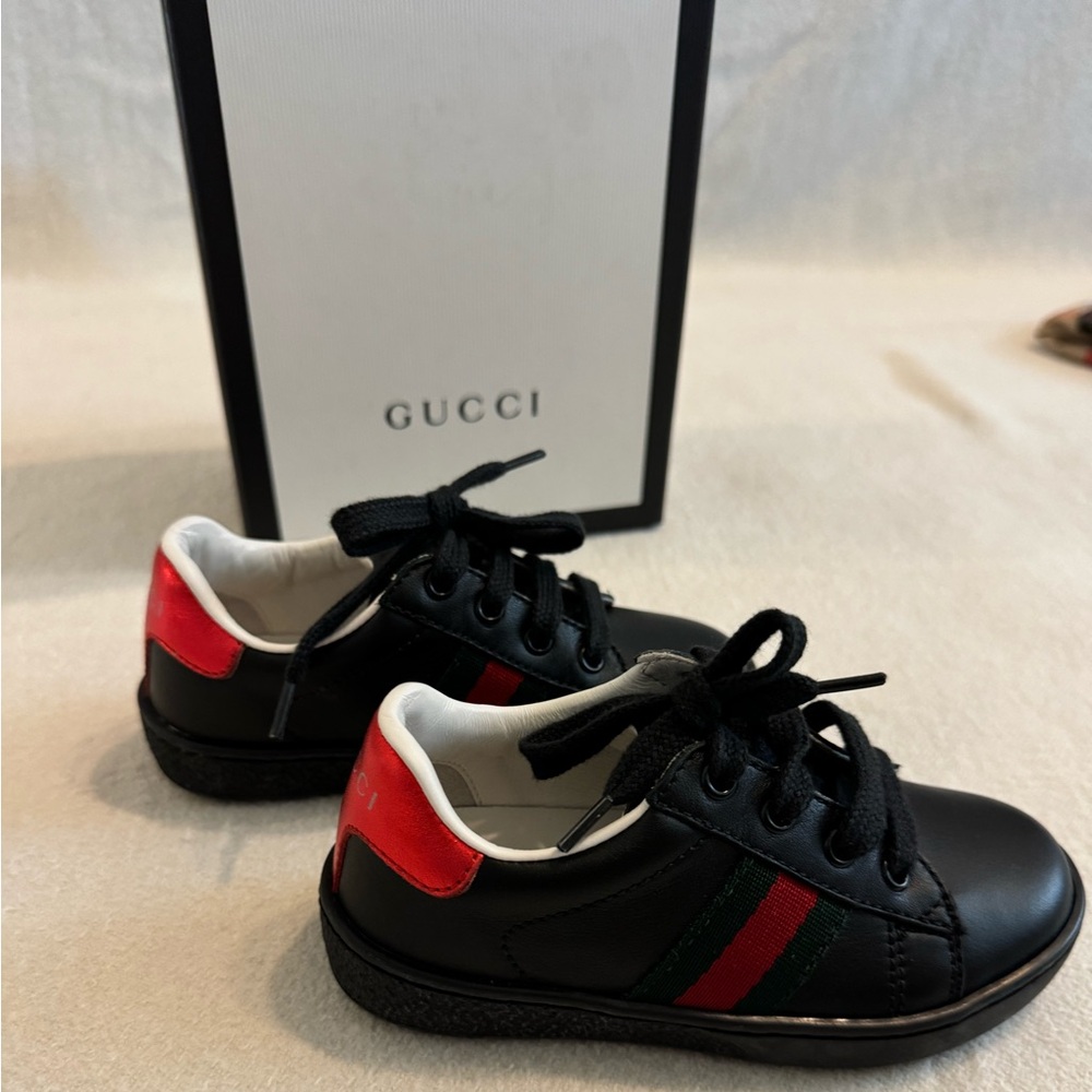 Black baby/toddler Gucci leather low top sneakers euro size 23 never worn in box